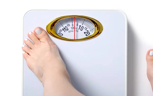 Female feet weighing scale — Stock Photo, Image