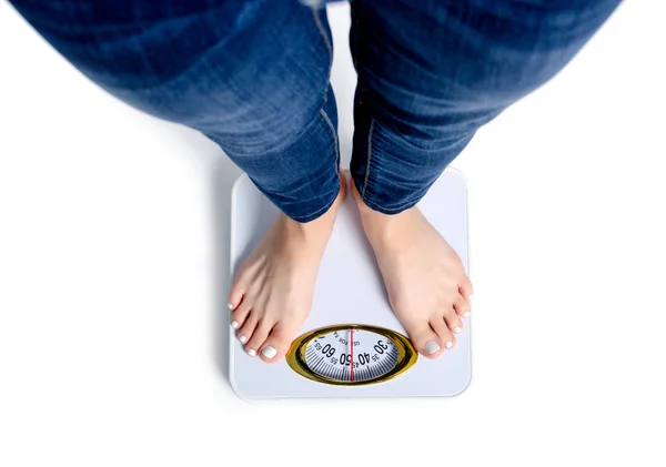 Female feet weighing scale — Stock Photo, Image