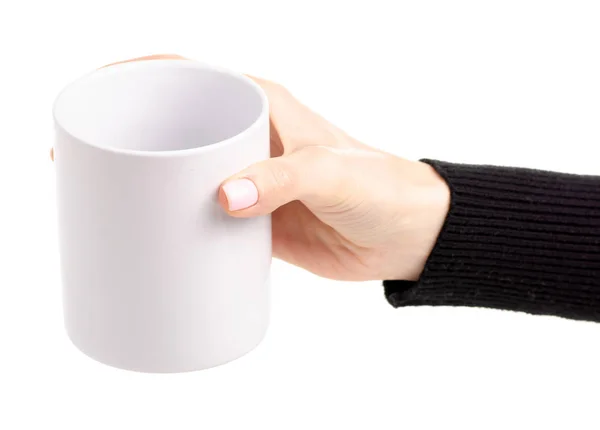 Hrnek bílý pohár v ženské ruce — Stock fotografie