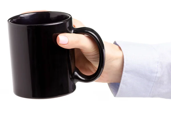 Svart kopp Mugg i kvinnlig hand — Stockfoto