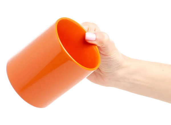 Taza de taza naranja en mano femenina —  Fotos de Stock
