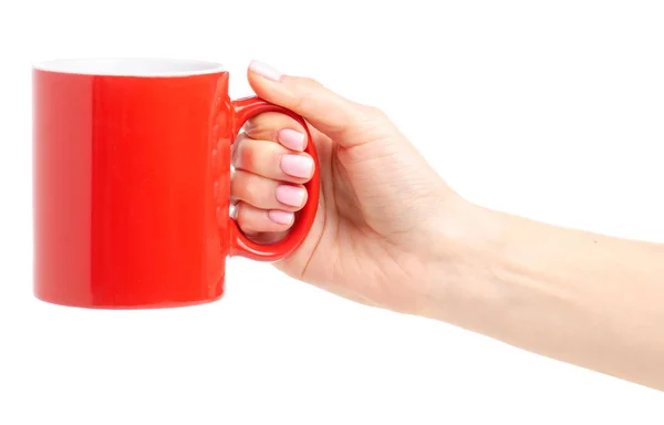 Red cup mug in female hand — Stock Photo, Image