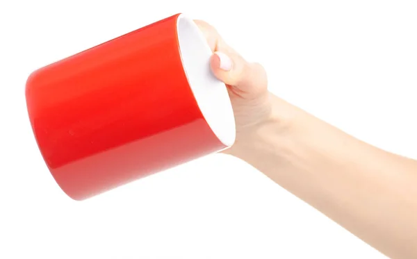 Caneca copo vermelho na mão feminina — Fotografia de Stock