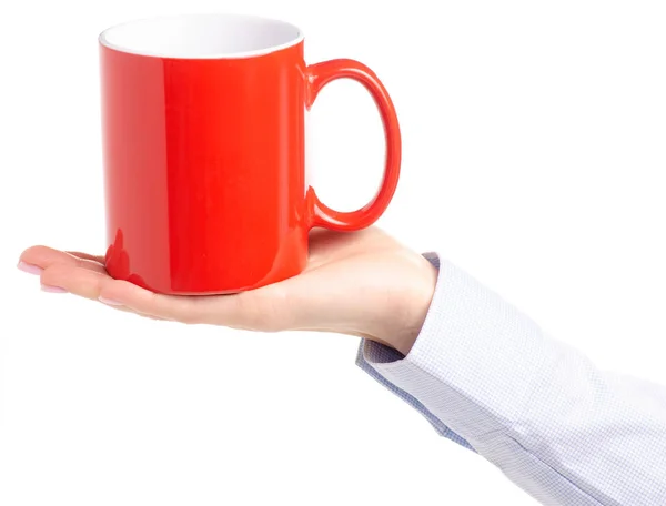 Taza de taza roja en mano femenina —  Fotos de Stock