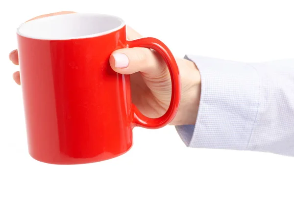 Taza de taza roja en mano femenina —  Fotos de Stock