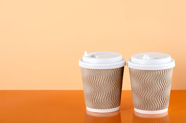 Cardboard cups of coffee