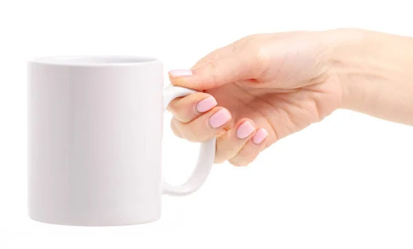 Caneca copo branco na mão feminina — Fotografia de Stock
