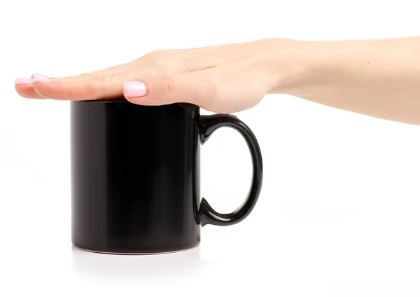 Caneca de copo preto na mão feminina — Fotografia de Stock