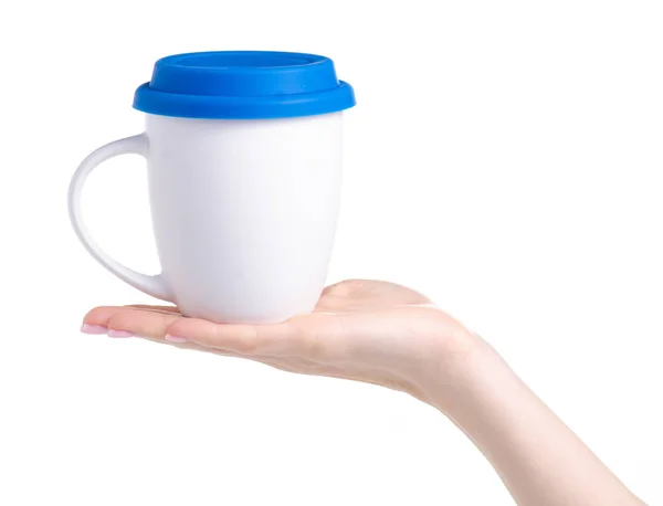 Weißer Becher mit blauem Deckel in der Hand — Stockfoto