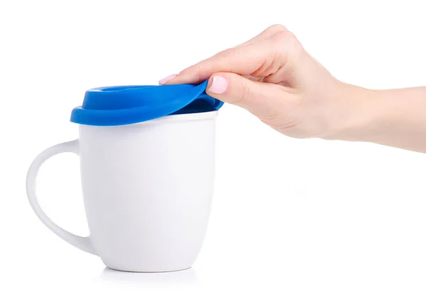 White caup mug with blue lid in hand — Stock Photo, Image