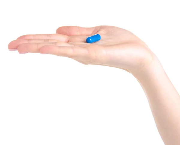 Comprimido cápsula azul na saúde medicina mão — Fotografia de Stock