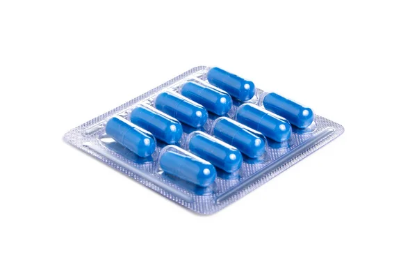 Pillen capsules blauw in blister geneeskunde gezondheid — Stockfoto