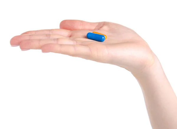 Niebieski kapsułki pigułki w rękę medycyna zdrowie — Zdjęcie stockowe