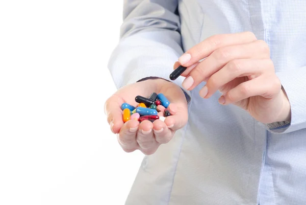 stock image Capsules pills medicine in woman hand