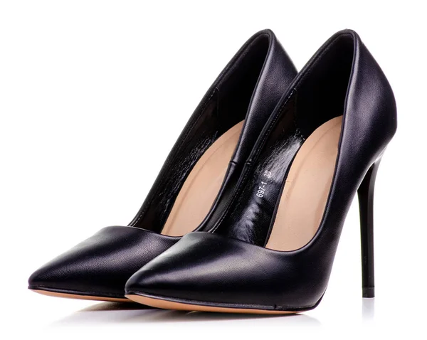 Weibliche schwarze Leder High Heels — Stockfoto
