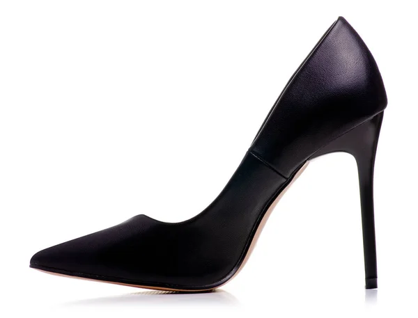 Ботинки из чёрной кожи на высоких каблуках — стоковое фото