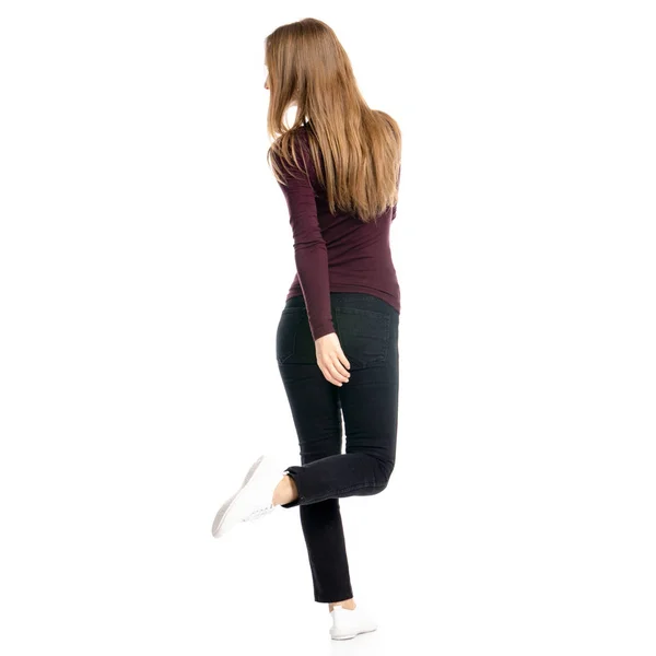 Kadın siyah kot pantolon ve gömlek çalıştırmak yürüme gider — Stok fotoğraf