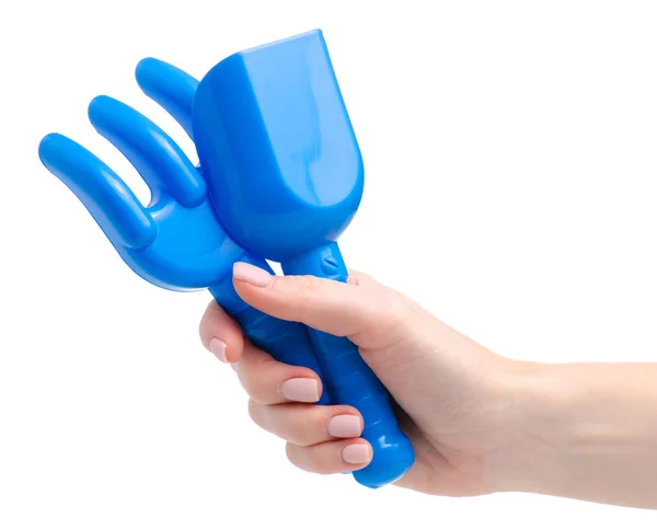 Baby blå rake spade sandlåda leksaker i handen — Stockfoto