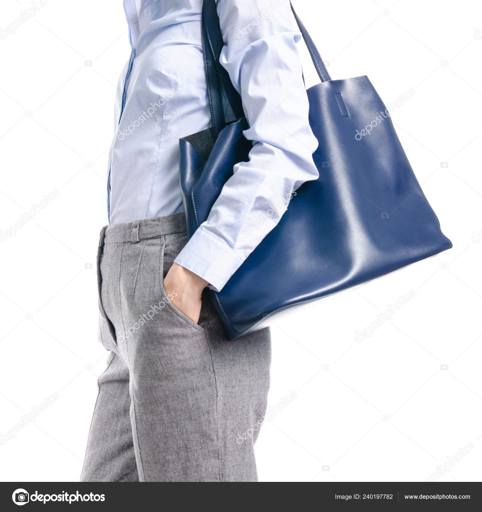 blue shirt and gray pants