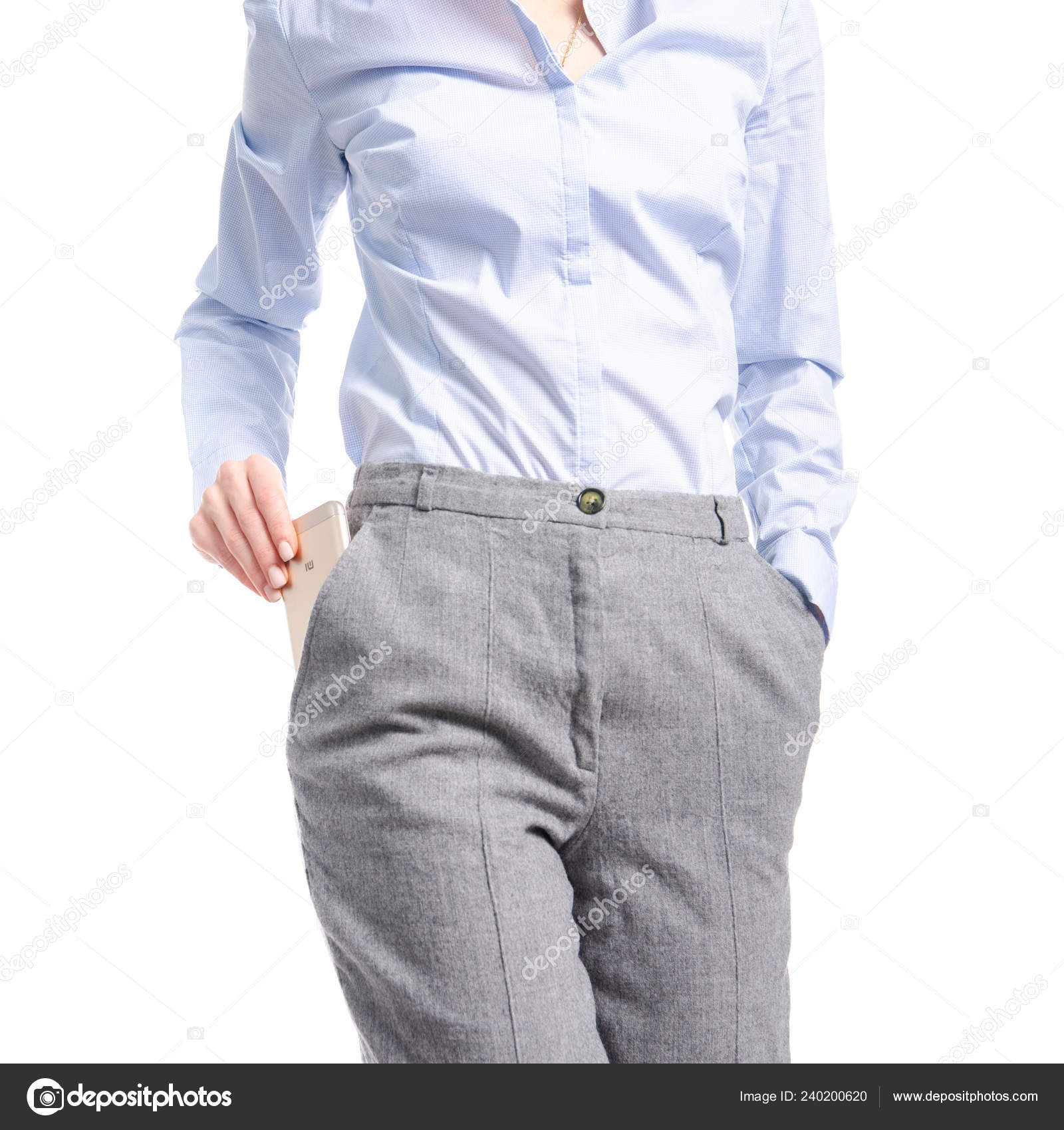 blue shirt and gray pants