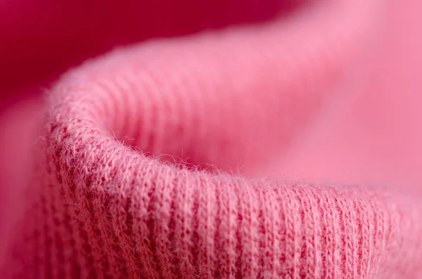 Fabric warm pink sweater textile material texture blur background macro