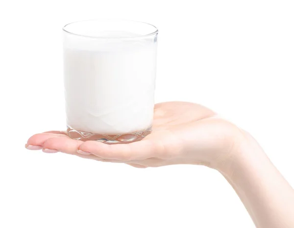 A glass of milk in hand — Stock Photo, Image