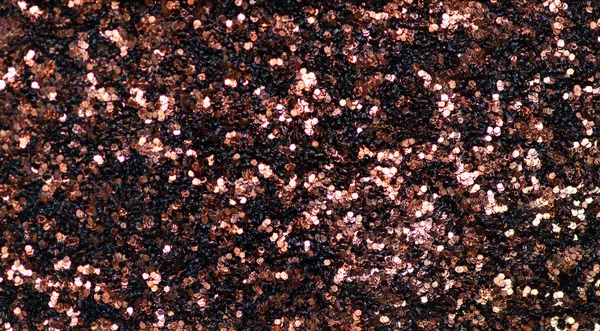 Brown gold sparkles glitter macro background texture