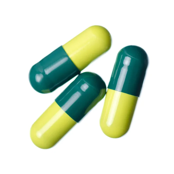 Pilules capsule médecine pharmacie vert — Photo