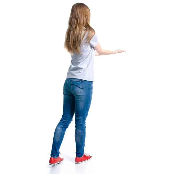 Жінка в джинсах футболка, що показує тримає — стокове фото