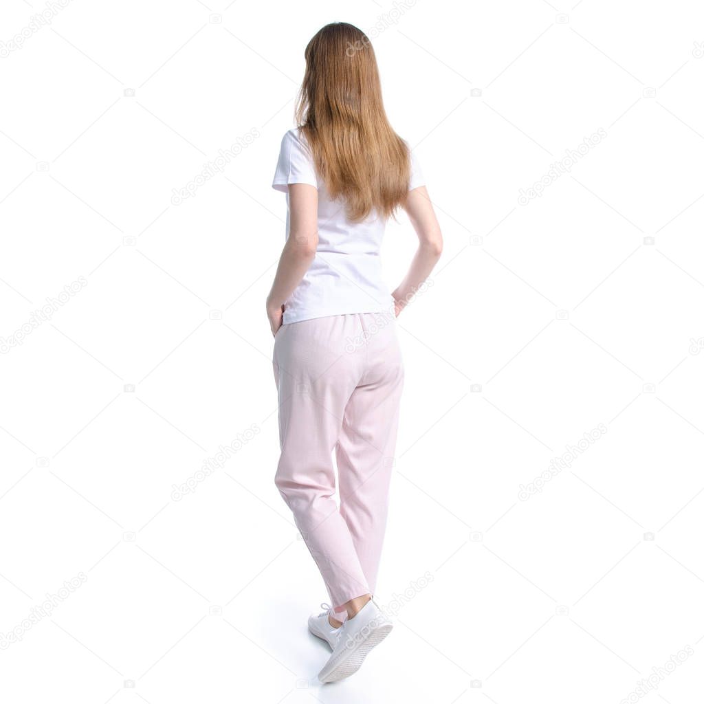 Woman in white t-shirt walking goes