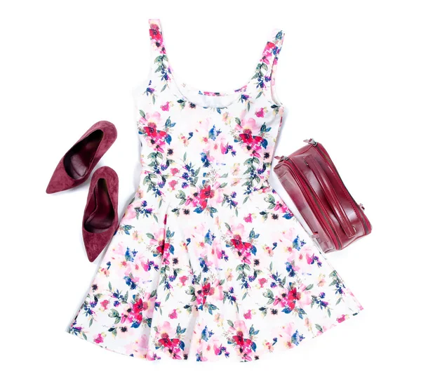 summer spring fashion clothes dress with floral print, red bag and high heel shoes