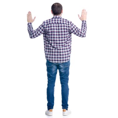 Bir erkekte kot gömlek ayakta eller yukarı