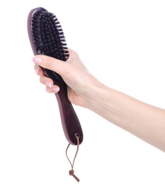 Elinde ayakkabı fırçası