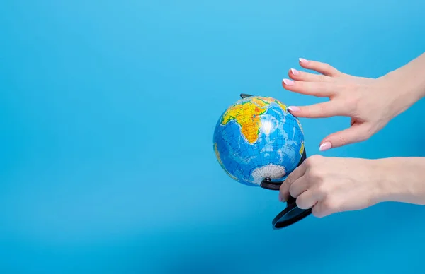 Globe world in hand