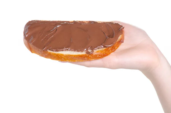 A kenhető csokoládé kenyér tészta a kezében — Stock Fotó