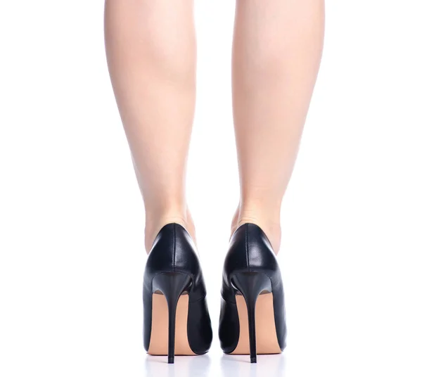 Жіночі ноги з чорними високими підборами мода взуття — стокове фото