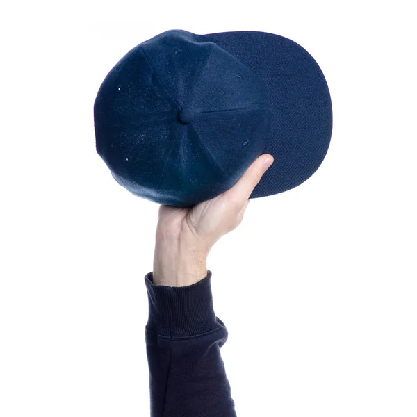 手中的蓝色帽子 — 图库照片