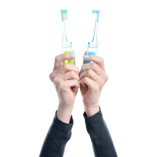 Deux brosses à dents à la main — Photo