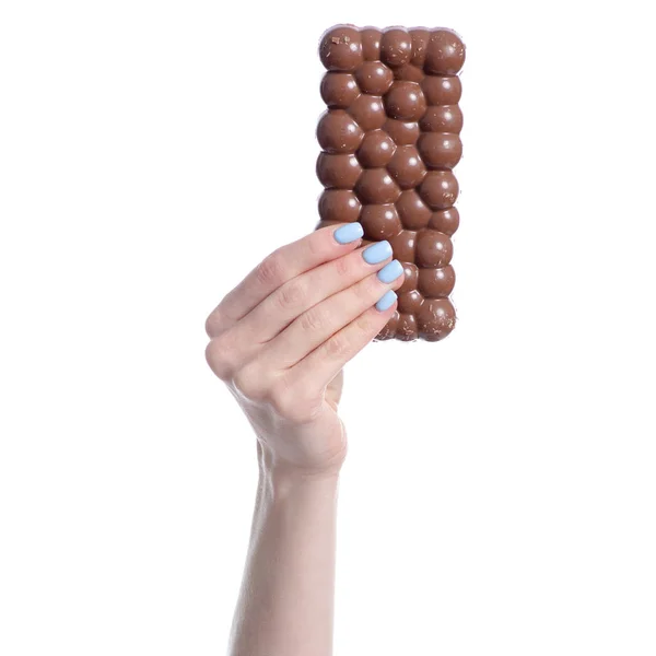 Schokolade porös in der Hand — Stockfoto