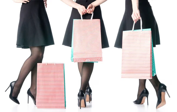 Ställ kvinnliga ben i svarta höga klackar skor väskor paket svart kjol mode — Stockfoto