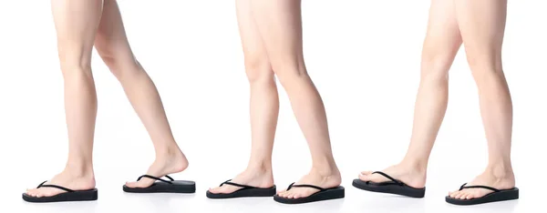 Set woman legs in black flip flops — Stock Photo, Image