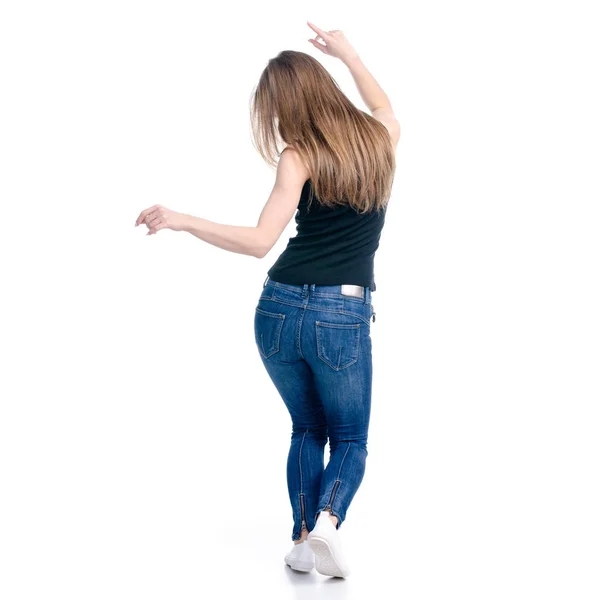 Женщина в джинсах танцует — стоковое фото