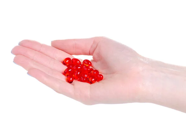 Czerwona kapsułka medycyna apteka w ręku — Zdjęcie stockowe