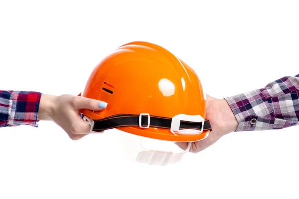Ruka dává helmě ruku — Stock fotografie