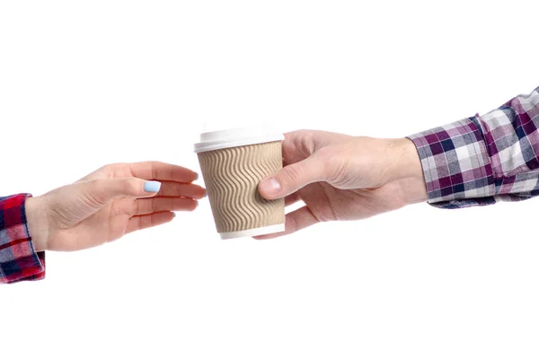 Mão dando xícara de café à mão — Fotografia de Stock