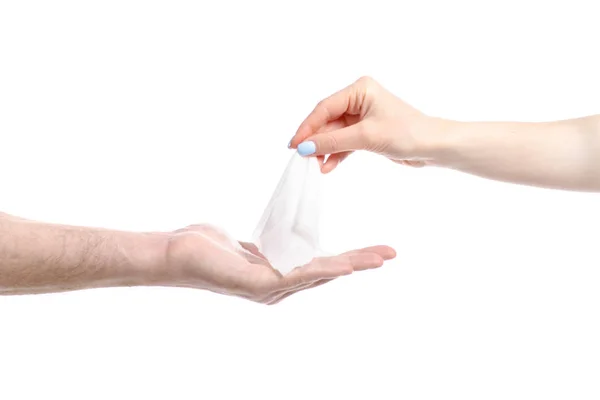 Hand give wet wipe to hand — Stock Photo, Image