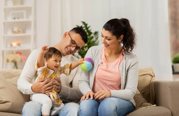 Happy family with baby daughter at home — Stock Photo, Image