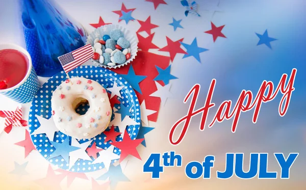 Donut with juice and candies on independence day — Stock Photo, Image