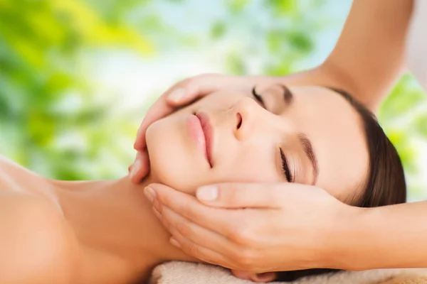 Close up of beautiful woman having face massage — Stock Photo, Image