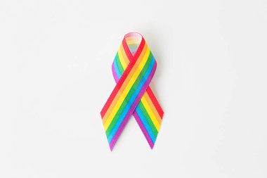 close up of gay pride awareness ribbon on white clipart